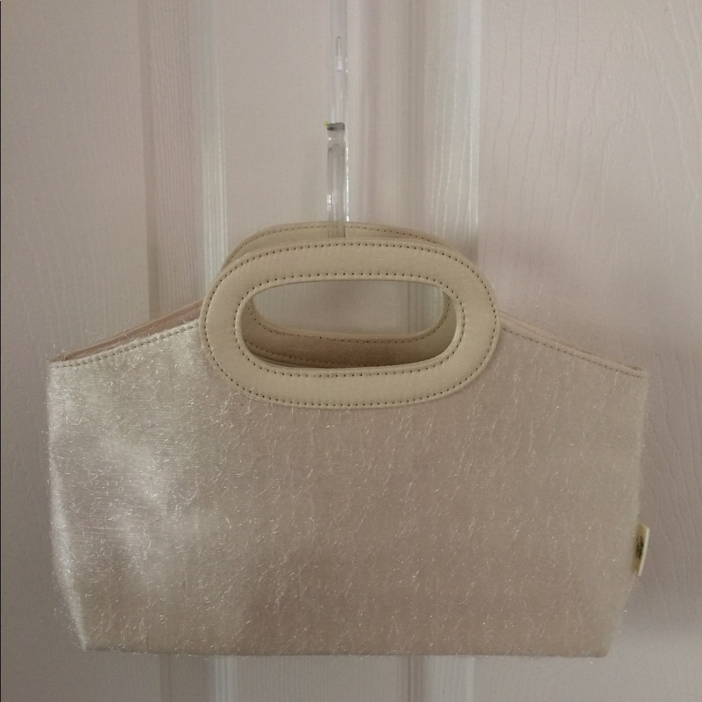 Givenchy Evening Hand Bag has 2 small spots on it